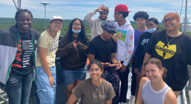 A group of teens from summer 2022 standing on top of a research tower at Harvard Forest