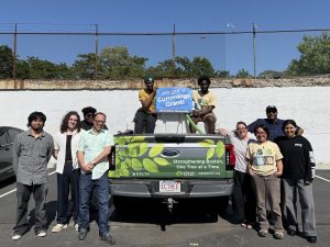 Tree Boston staff with watering truck and announcement of a Cummings Grant